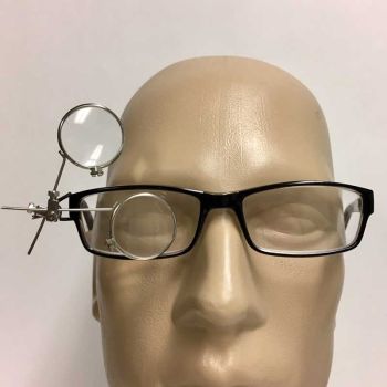double lens 3.5x and 5x  or 10x combined all metal clip on loupe clipped on to eyeglasses front view