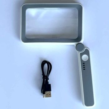 Large 3x rectangular rechargeable led magnifier with 3 brightness settings and usb charging cable magnifying text