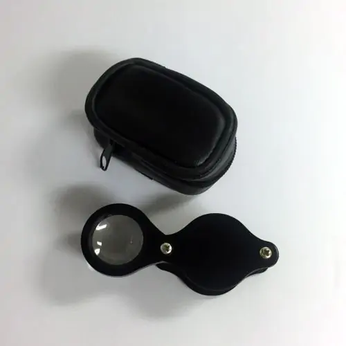 black metal small size 10x jewelers loupe with black zippered storage case 